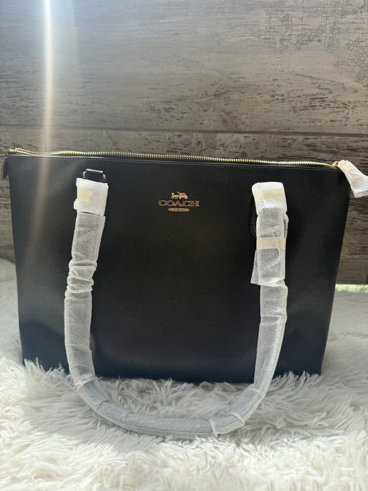 Cartera Coach